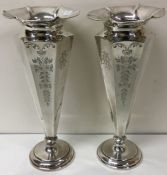 A large pair of decorative silver vases. Sheffield 1910. By Fenton Brothers Ltd.