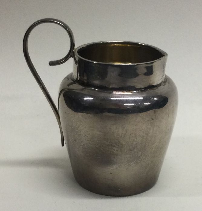 A small silver cream jug. Birmingham. Approx. 31 g
