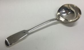 A fiddle pattern silver sauce ladle. London. By RW. Approx. 52 grams.