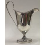 A George III silver jug with beaded border. London 1781. By William Bennett.