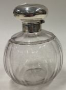 A silver and glass scent bottle. Birmingham circa 1910.