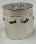 A rare silver and enamelled contemporary style snuff box with lizard decoration.