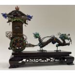 A large Chinese silver and enamelled dragon carriage.