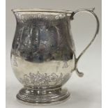 A large rare William IV chased silver mug. London 1834.