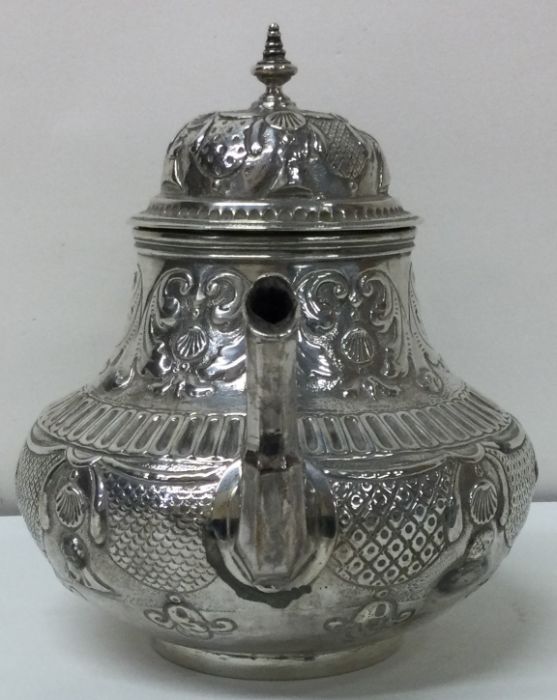 An early chased 18th Century Dutch silver teapot. Approx. 284 grams. - Image 2 of 3