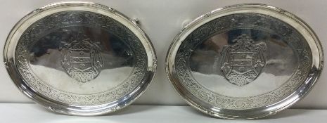 A pair of Georgian 18th Century silver salvers bearing coat of arms. London 1793.