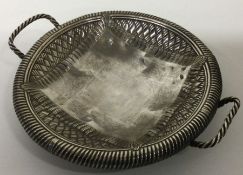 A very rare early 20th Century Russian trompe l'oeil silver bread basket.