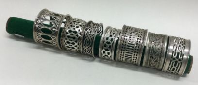 A group of seven various silver napkin rings. Various dated and makers.
