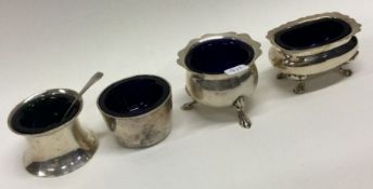 A good group of four silver mounted salts. Approx. 66 grams. Est. £20 - £30.
