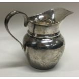 A heavy silver bachelor's cream jug. London. Approx. 70 grams.