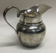 A heavy silver bachelor's cream jug. London. Approx. 70 grams.