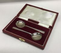 A pair of cased silver preserve spoons. London. Approx. 24 grams. Est. £20 - £30.