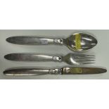 GEORG JENSEN: A three piece silver cutlery set.