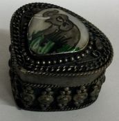 A Continental silver box with an enamelled top. Approx. 27 grams.