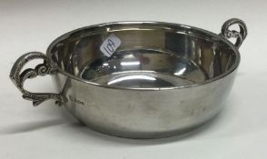 A heavy silver two handled bowl. London. Approx. 117 grams. Est. £40 - £60.