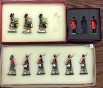 A boxed set of six lead figures together with others.