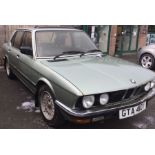 BMW 528: A BMW 528 automatic car in green with alloy wheels.