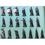A group of nineteen painted lead figures of a band.