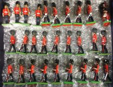 BRITAINS: A large selection of soldiers in dress.
