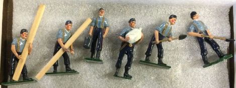 A group of six lead figures in the form of workmen.
