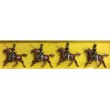 BRITAINS: A boxed set of four figures on horse back.