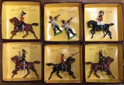 BRITAINS: Six boxed soldiers on horseback.