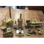A good collection of brass trains and steam engines.