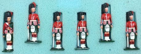 A boxed set of six Scots Guard figures.