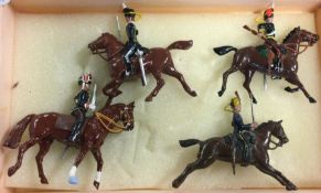 BRITAINS: Four lead horses and riders.