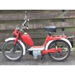 DEMM: A scooter in red. Registration: JNM 851N.