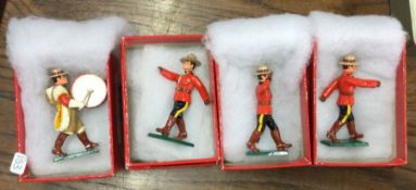 Four Canadian Troopers figures.