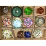 12 glass paperweights.