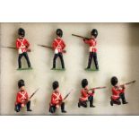 BRITAINS: Seven painted soldiers.