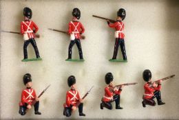 BRITAINS: Seven painted soldiers.