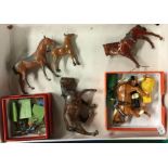 A mixed lot of painted lead figures and horses.