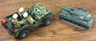 A tin plate clockwork US Army jeep with figures together with a Solido French tank.