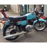 CZ: A large motorbike in blue. Registration: VTA 646S.