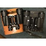 Two pairs of binoculars.