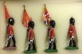 BRITAINS: A set of four soldiers in dress.