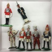 A selection of painted miniature lead soldiers.