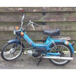 PUCH: A scooter in blue. Registration: D433 MTT.