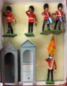 BRITAINS: Four Queen's Guard figures.