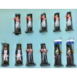 A group of eleven painted lead figures in Army dress.