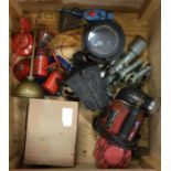 A box containing compasses, oil cans etc.