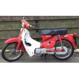 HONDA 90: A scooter in red. Registration: VEL 494J.