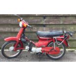 HONDA CLUB 90: A motorbike in red. Registration: D121 NKE.