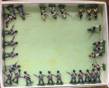 A box containing miniature lead soldiers.
