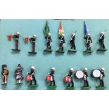 A group of painted lead figures of a band.