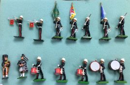 A group of painted lead figures of a band.