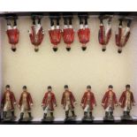 A set of fourteen miniature lead figures.